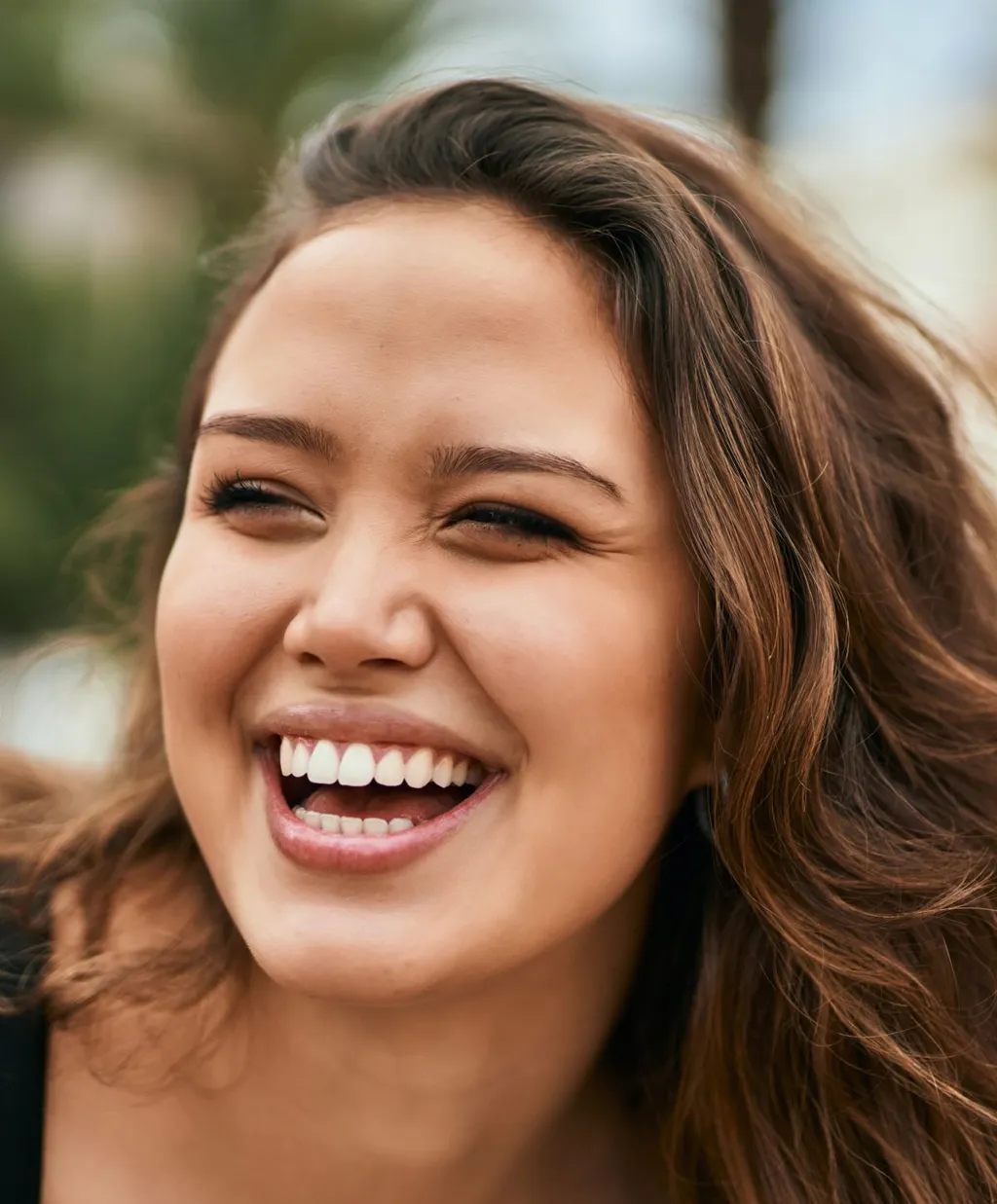 Burbank chemical peel model with brown hair smiling